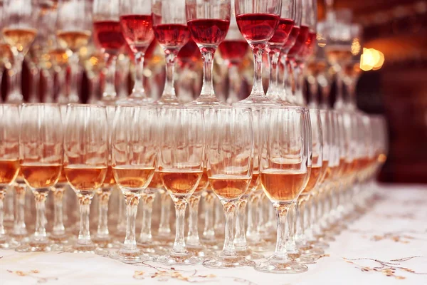 Wedding glasses filled with wine and champagne — Stock Photo, Image