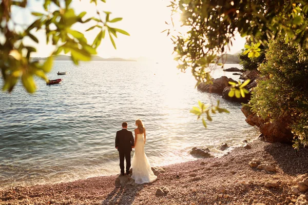 Closeup of bride and groom on the beach — Stock Photo, Image