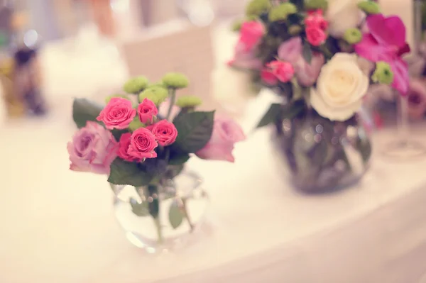 Flowers on table — Stock Photo, Image