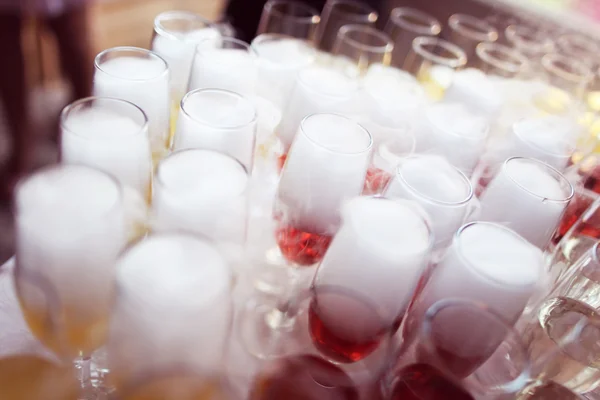 Many glasses of  champagne on table — Stock Photo, Image