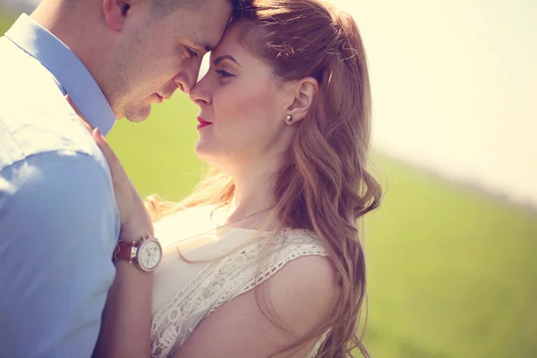 Portrait of lovely couple in the sunlight — Stock Photo, Image