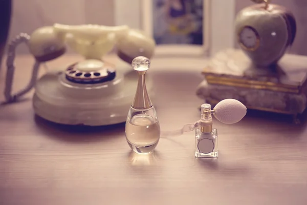 Perfume bottles on table — Stock Photo, Image