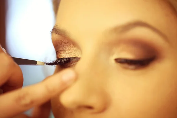 Ogen van een vrouw op make-up studio — Stockfoto