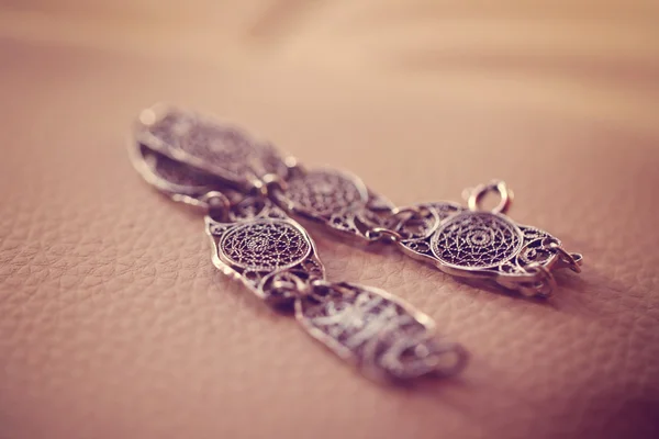 Bracelet on wooden table — Stock Photo, Image