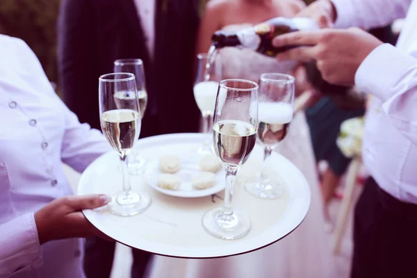 Waiter serving champagne — Stock Photo, Image