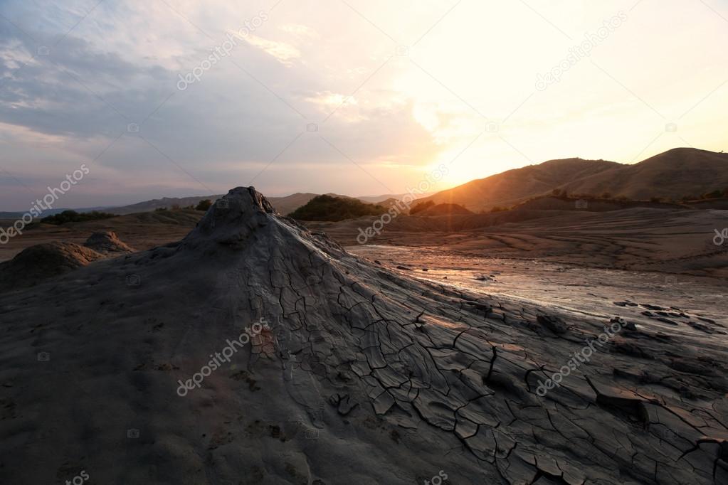 Beautiful sunset at mud volcanos in Buzau, Romania