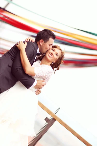 Bride and groom feeling in love — Stock Photo, Image