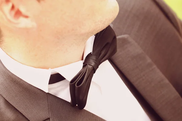 Close-up with groom's elegant bowtie — Stock Photo, Image