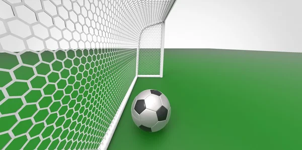 A black and white soccer ball football and a goal post on a green field like grass — Stock Photo, Image