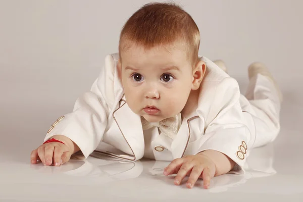 Little baby boy in tuxedo smiling and having fun — Stock Photo, Image