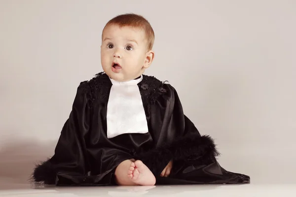 Little baby boy in black coat on isolated background — Stock Photo, Image
