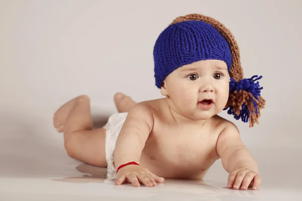 Cute little baby boy with winter hat on isolated background — Stock Photo, Image