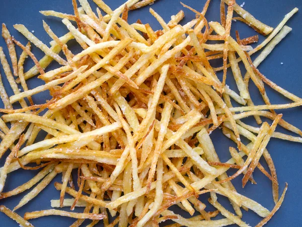 Top View Hot Fried Potato Sticks Bright Blue Plate Delicious — 图库照片