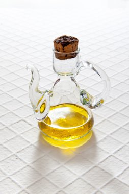olive oil in a small glass jar