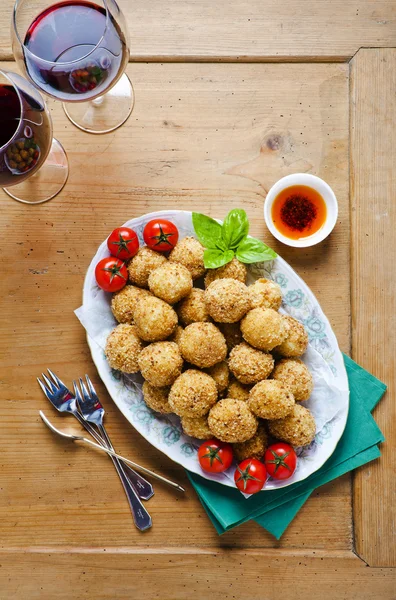 Healthy italian appetizer with risotto balls arancini , green ol — Stock Photo, Image
