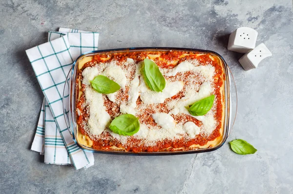 Classic vegetarian lasagna on a gray stone background — Stock Photo, Image