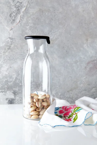 Pistachio in a bottle for smoothie. healthy cooking — Stock Photo, Image