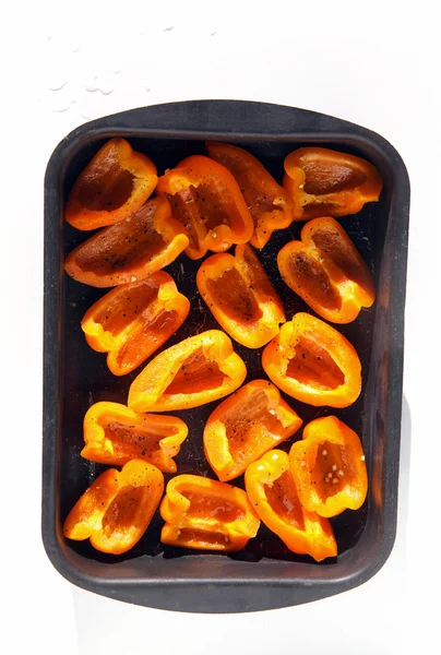 Peppers on baking sheet — Stock Photo, Image