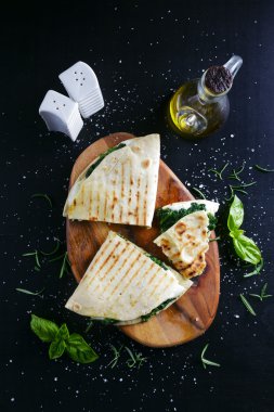 piadina with spinach and mozzarella. Italian healthy snack. stre clipart