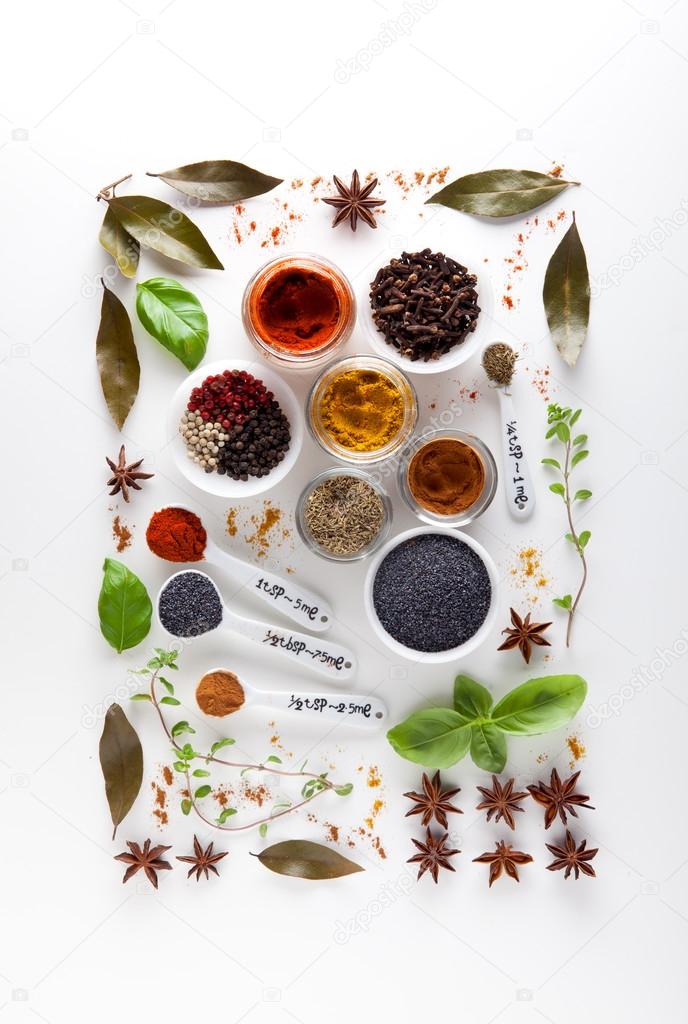 variety of spices on a white background