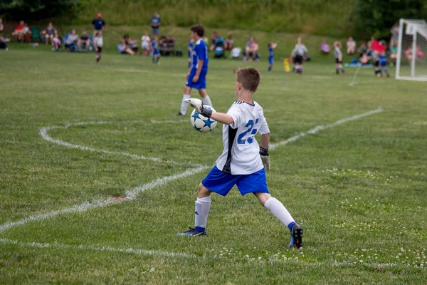 Young Soccer Goalie Begins Kicking Ball Out His Goal — Stock Photo, Image