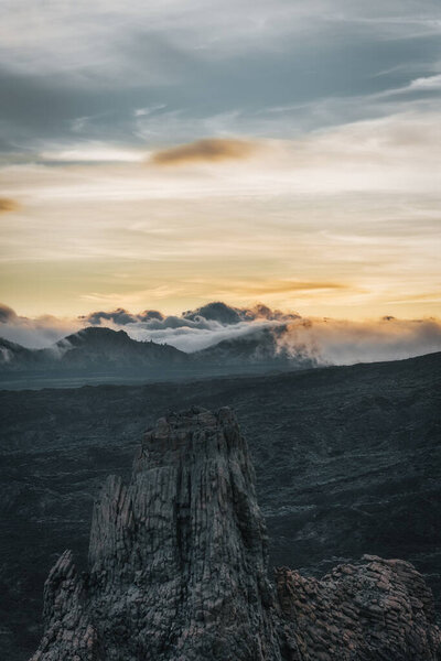 Mountainous landscape of a volcano on an island at sunset