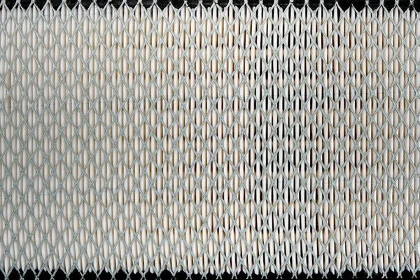 Arabanın yüzeyi ve yapısı hava filtresi ya da klima sistemi. Fiber madde ve metal ızgara desenli arkaplan, boşluğu kopyala
