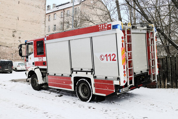 Number 112 on the firetruck. Common european and worldwide emergency number on the vehicle of the emergency services brigade, RIGA, LATVIA - MARCH 7, 2021
