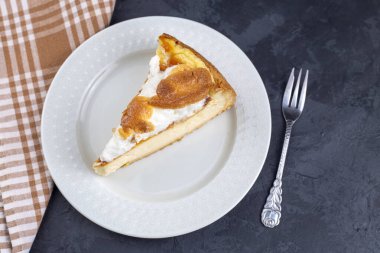 piece of cake with creamy texture on the top