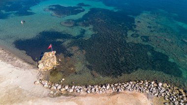 Cesmealti - Urla - Izmir - Turkey, View on ''Bride Rock'' or ''Sail Rock''. Gelinkaya