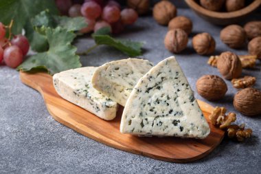Sliced blue cheese - Roquefort cheese or gorgonzola cheese 