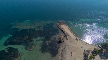 Cesmealti - Urla - Izmir - Turkey, View on ''Bride Rock'' or ''Sail Rock''. Gelinkaya
