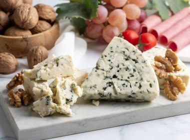 Sliced blue cheese - Roquefort cheese or gorgonzola cheese 