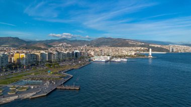 Karsiyaka - İzmir - Türkiye, 09 Aralık 2025, Karsiyaka feribot iskelesi ve insansız hava aracı ile yapılan heykel atışları