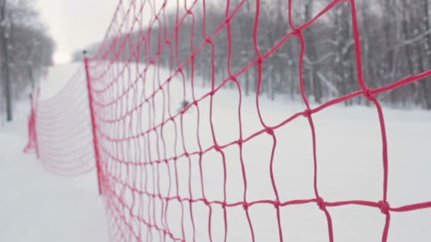 The modern red rope grid piste for alpine skiing. — Stock Video