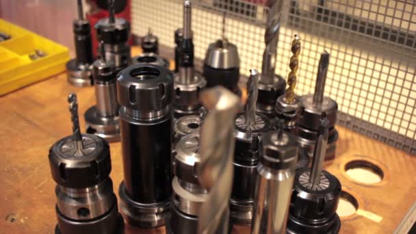 Drill bits of different sizes  for industrial equipment — Stock Video