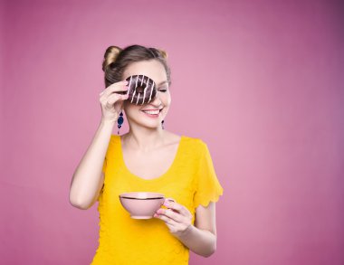 young girl eat sweet donut