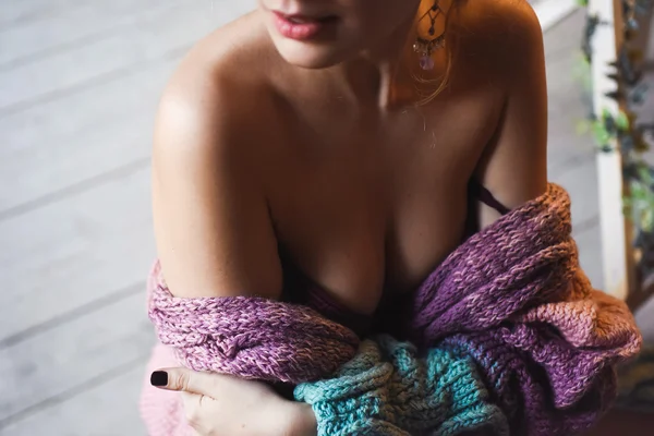 Close-up portrait of a young sexy girl in knitted sweater — Stock Photo, Image