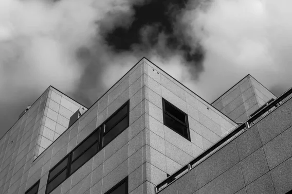 Office building shot from below shot in black and white