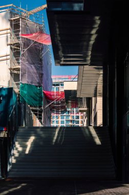 Amsterdam, the Netherlands, July 17, 2021: Vertical image of stairs leading to a construction site on the NDSM-werf in Amsterdam - North