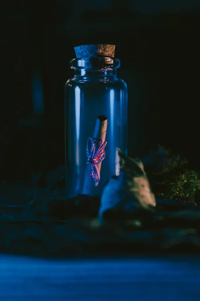 Low Key Image Glass Stopper Bottle Dark Containing Rolled Brown — Stock Photo, Image