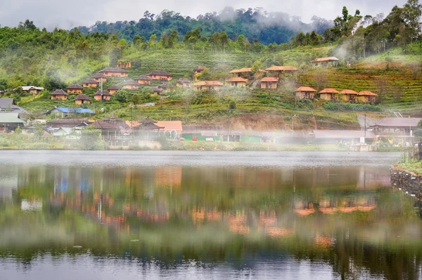 Reflection of buildings and mountain in the mist, Maehongson,  Thailand — Stock Photo, Image