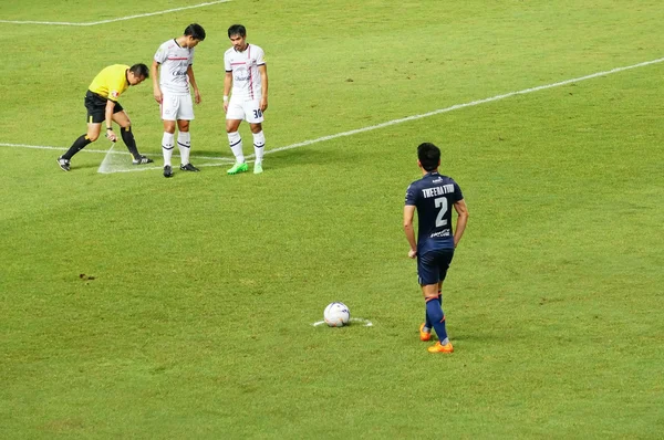 BURIRAM, THAILAND - AUGUST 15: Referee set up line for free kick during Thai Premier League 2015 between Buriram United and Suphanburi F.C. at I-mobile stadium on August 15 ,2015 in Buriram, Thailand.