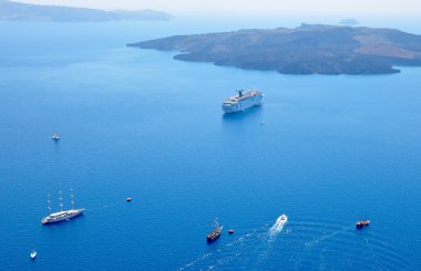 Ferries moving to Volcano of Santorini, Greece
