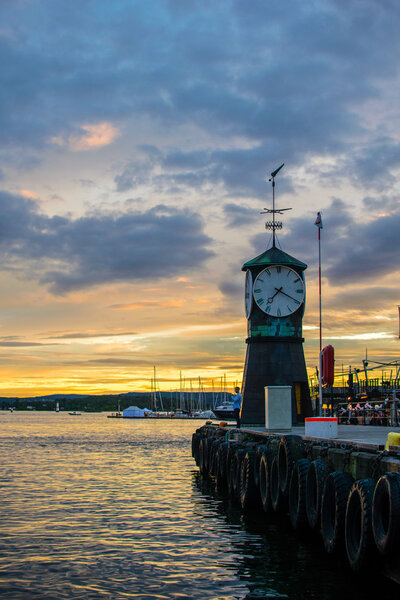 Aker Brygge embankment on a sunset, Oslo, Norway