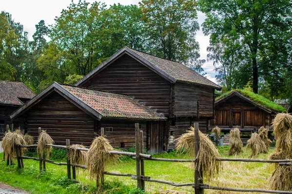 Landscape with wooden building — Stock Photo, Image