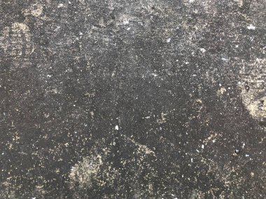 Eski koyu beton zemin dokusu soyut arkaplan ve boş alan.