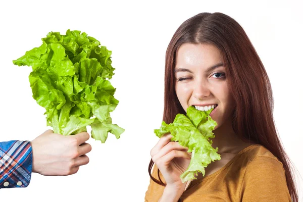 Winking girl with lettuce — Stock Photo, Image