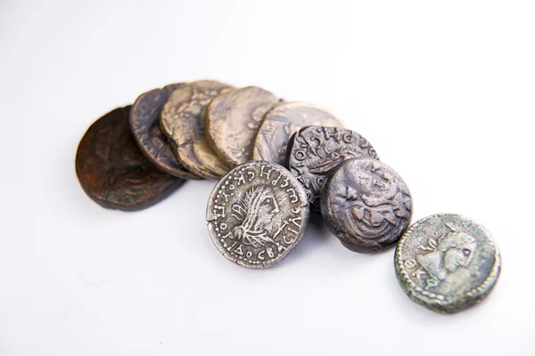 Vintage coins with portraits of kings on over white — Stock Photo, Image
