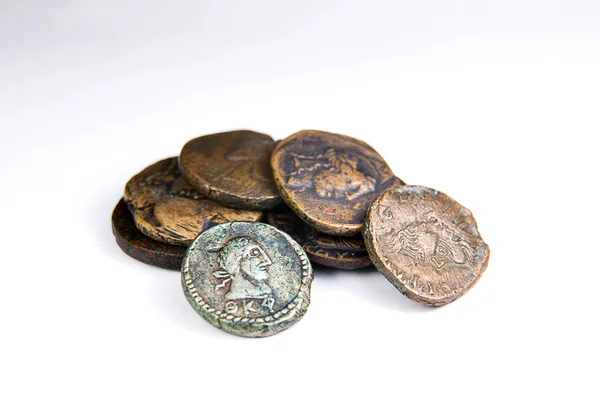 Vintage coins with portraits of kings on over white — Stock Photo, Image